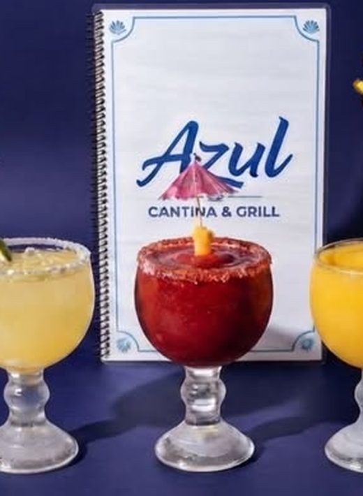 Three handcrafted margaritas beside the Azul menu
